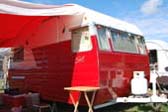 Great restoration of a classic 1957 Shasta trailer with red and white paint